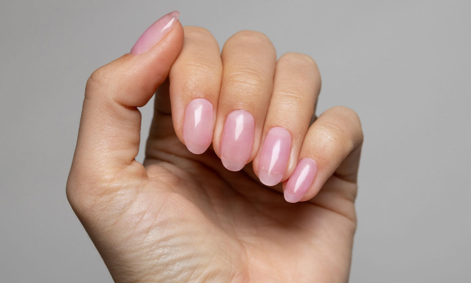 Soft pink glossy nails